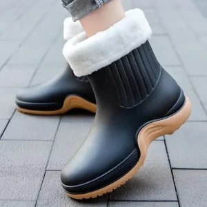 Bottines de pluie femme noires à revers fourré blanc