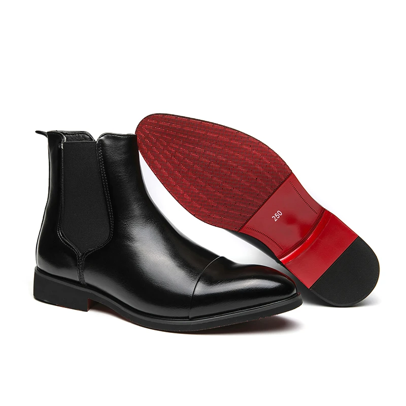 Détail des bottines Chelsea homme noires à semelle rouge authentique