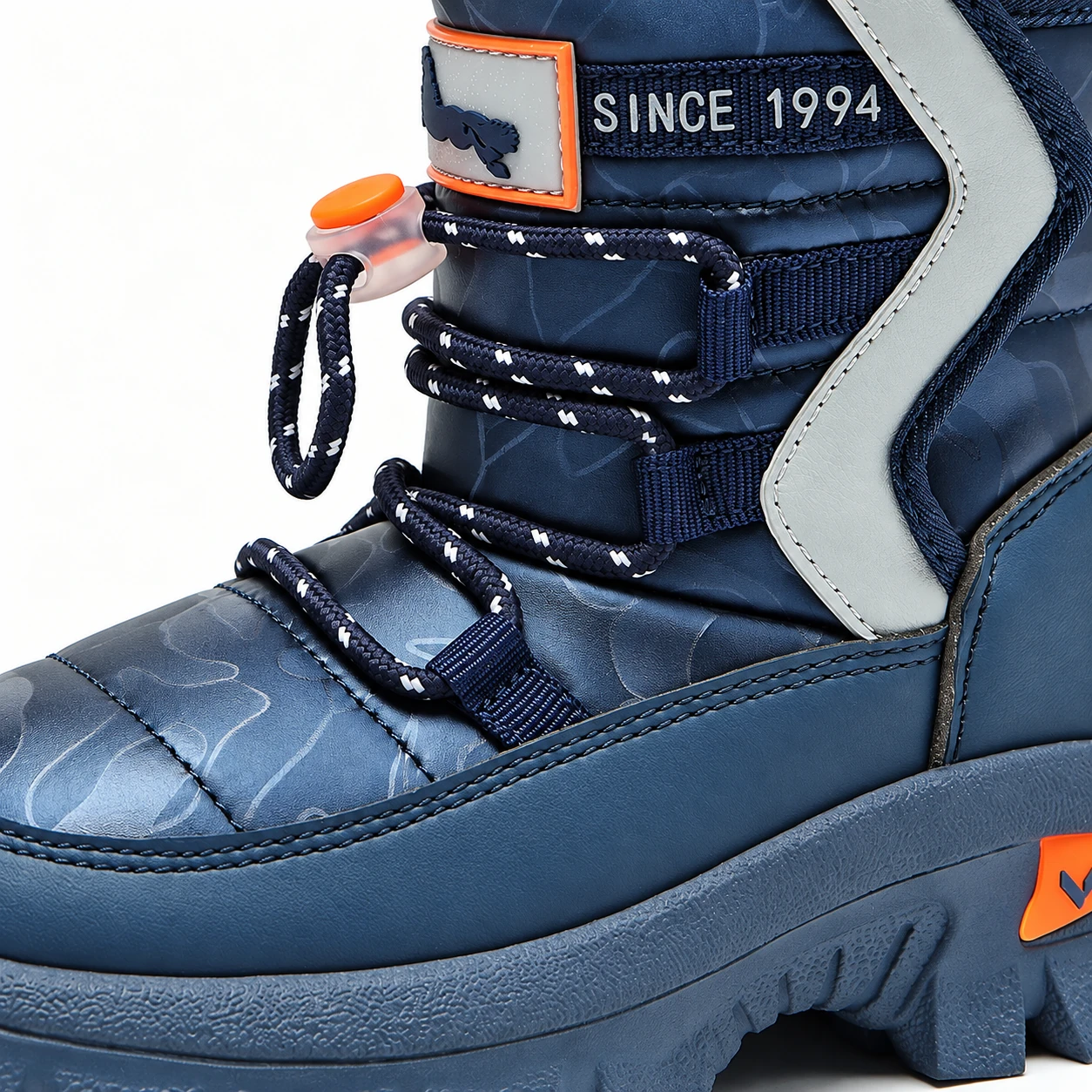 bottine enfant bleu marine a lacets et details orange vue rapprochee finitions