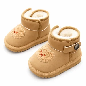bottines bebe beige the au lait fourrees a motif lion sur fond blanc