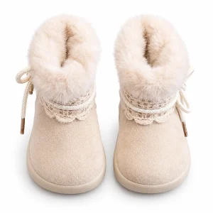bottines bebe fille beiges fourrees a noeud sur fond blanc