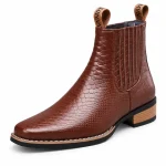 bottines chelsea homme marron effet reptile vue de trois quarts sur fond blanc 45374