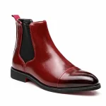 bottines chelsea homme rouges a semelle rouge vue de trois quarts sur fond blanc 45404