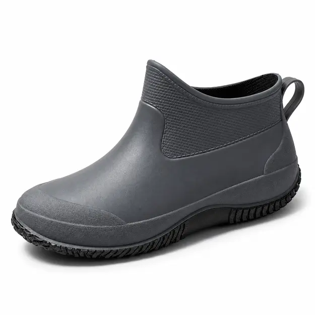 bottines de pluie femme grises a semelle contrastante vue de trois quarts sur fond blanc 45162