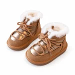 bottines enfant camel fourrees a lacets et zip sur fond blanc