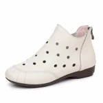 bottines femme blanches ajourees plates vue de trois quarts sur fond blanc 45245