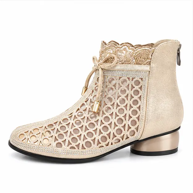 bottines femme dorees ajourees a zip vue de profil sur fond blanc 45234