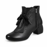 bottines femme noires fourrees a zip et talon carre vue de trois quarts sur fond blanc 45212