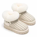 bottines fille beiges fourrees a sequins et zip sur fond blanc