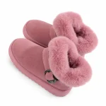 bottines fille roses fourrees a revers sur fond blanc