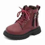bottines garcon bordeaux fourrees a lacets et zips sur fond blanc