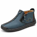 bottines homme bleues a zip style mocassin vue de trois quarts sur fond blanc 45352