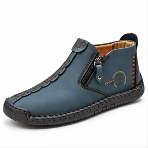bottines homme bleues a zip style mocassin vue de trois quarts sur fond blanc 45352
