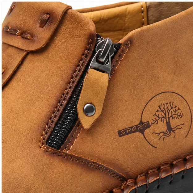 bottines homme brun jaune fourrees a zip style mocassin detail du zip et des coutures apparentes 45344