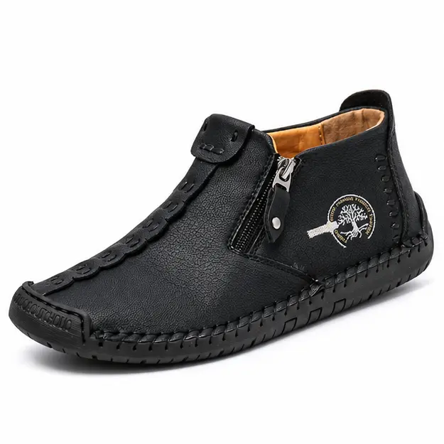 bottines homme noires fourrees a zip style mocassin vue de trois quarts sur fond blanc 45345