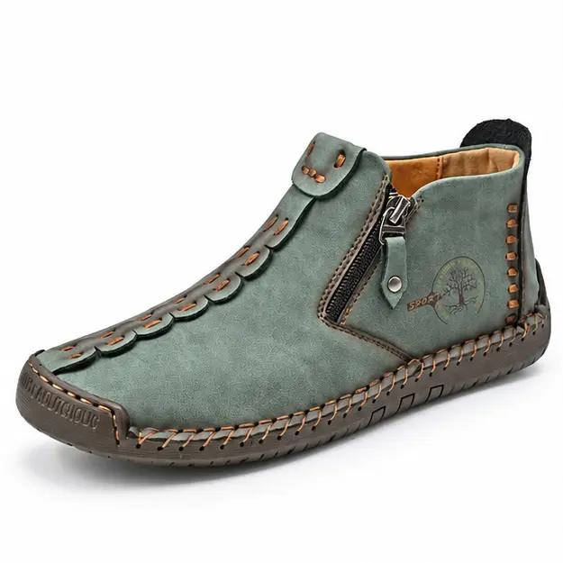 bottines homme vert fonce a zip style mocassin vue de trois quarts sur fond blanc 45346