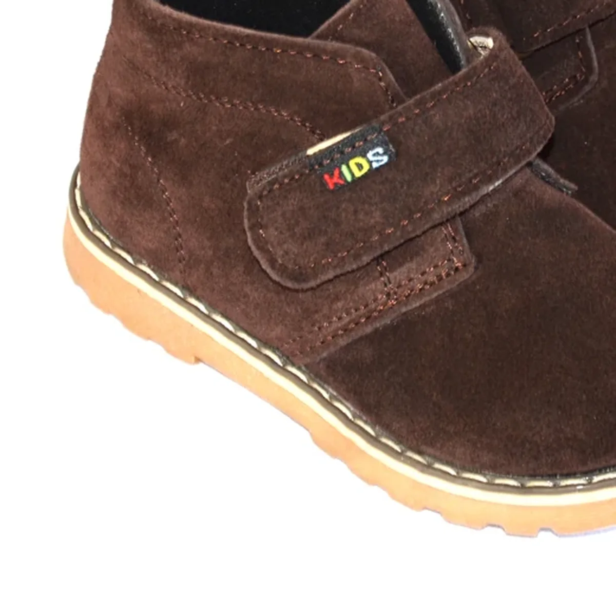 detail de la matiere et de la semelle des bottines bebe garcon marron a scratch