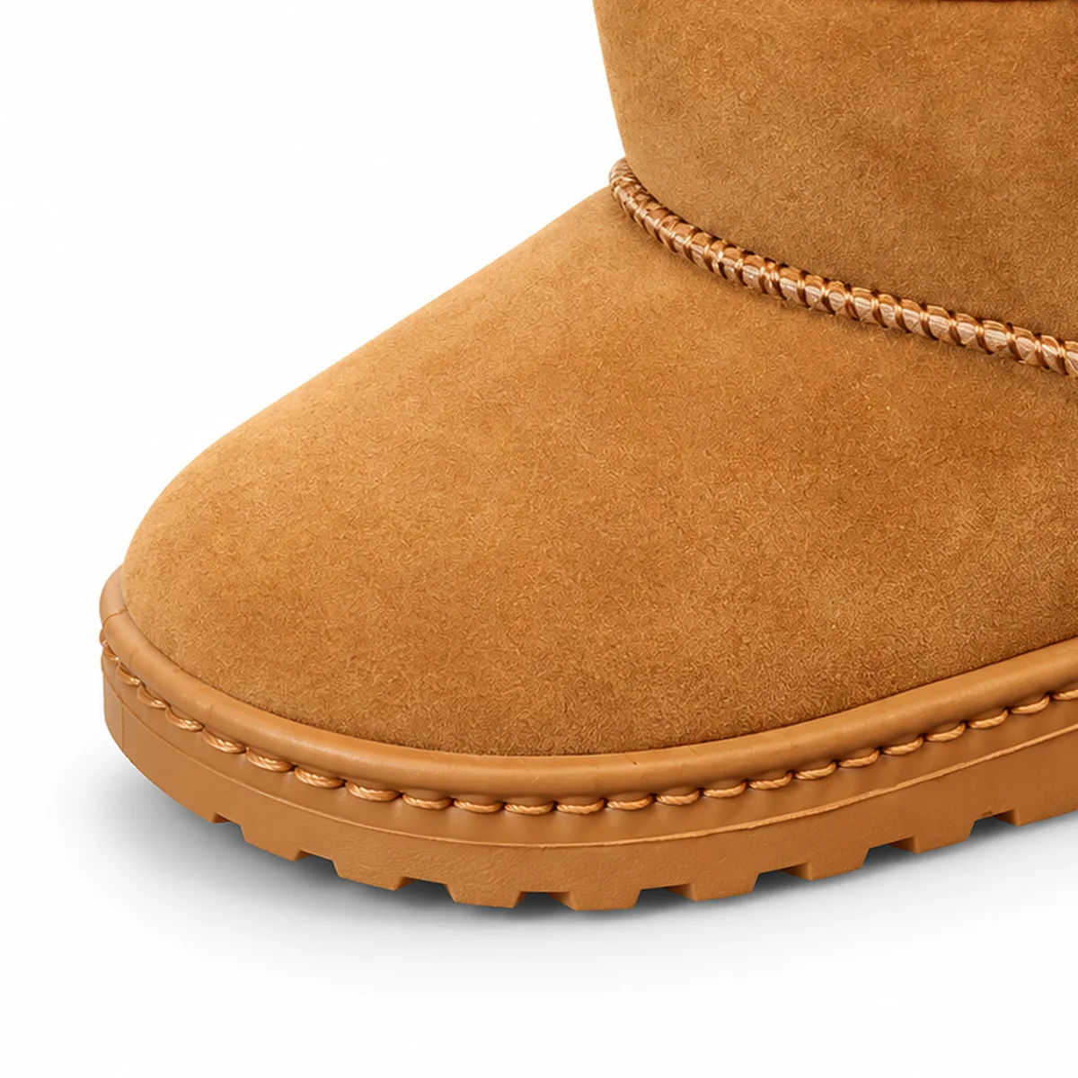 detail de la matiere et de la semelle des bottines fille camel fourrees a enfiler