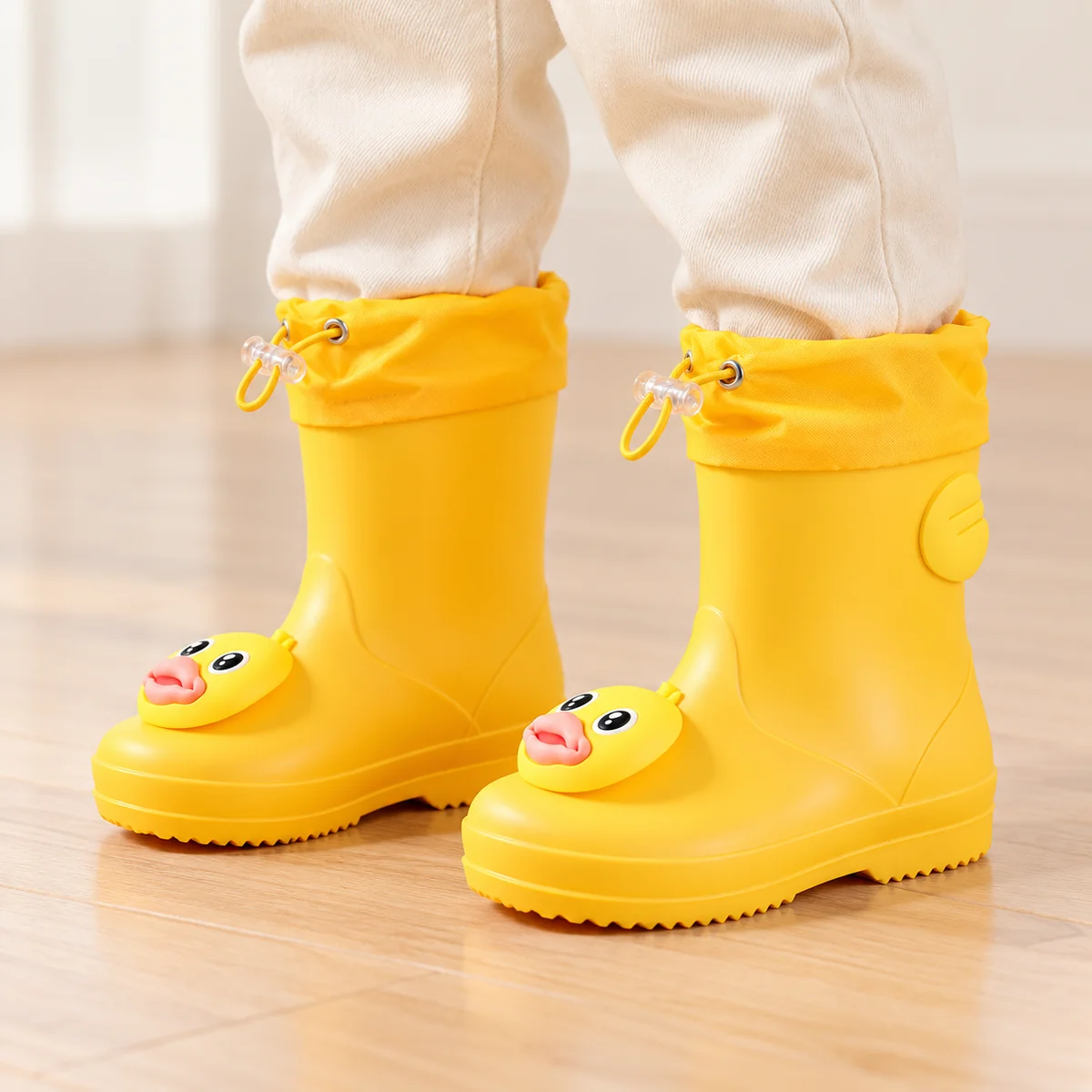 44415 13b bottes de pluie enfant jaunes a canard porte
