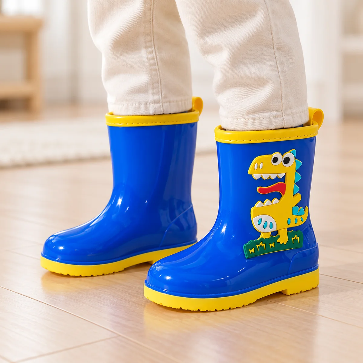 bottes de pluie enfant bleues a motif 44389 13a porte