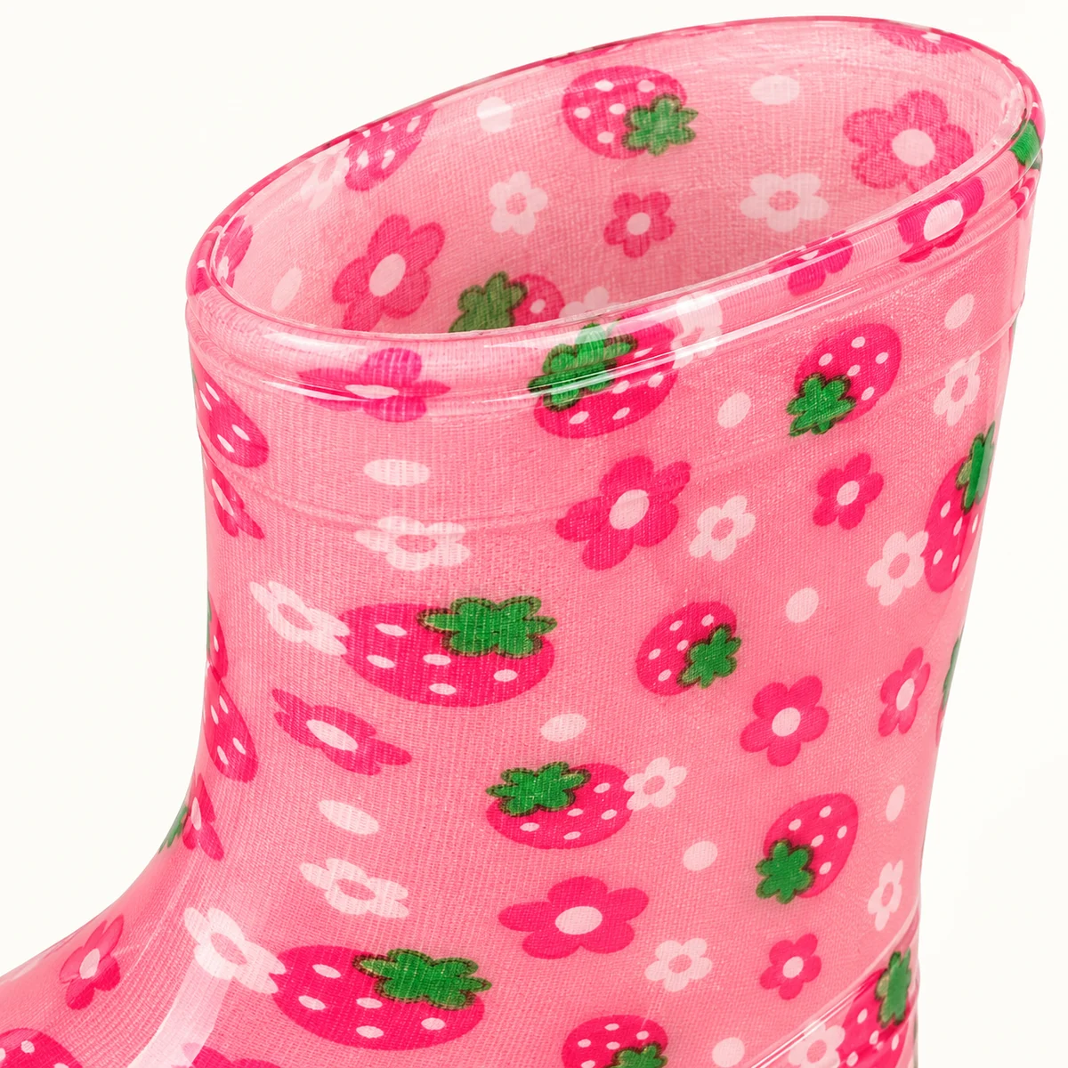 Détail de bottes de pluie roses à fraises et fleurs