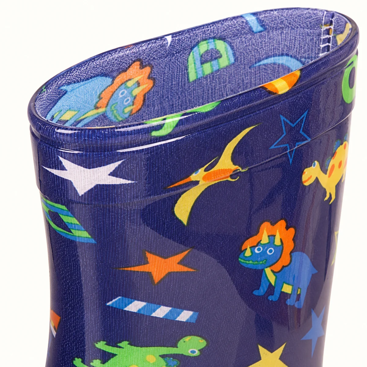 Détail de bottes de pluie à dinosaures et étoiles