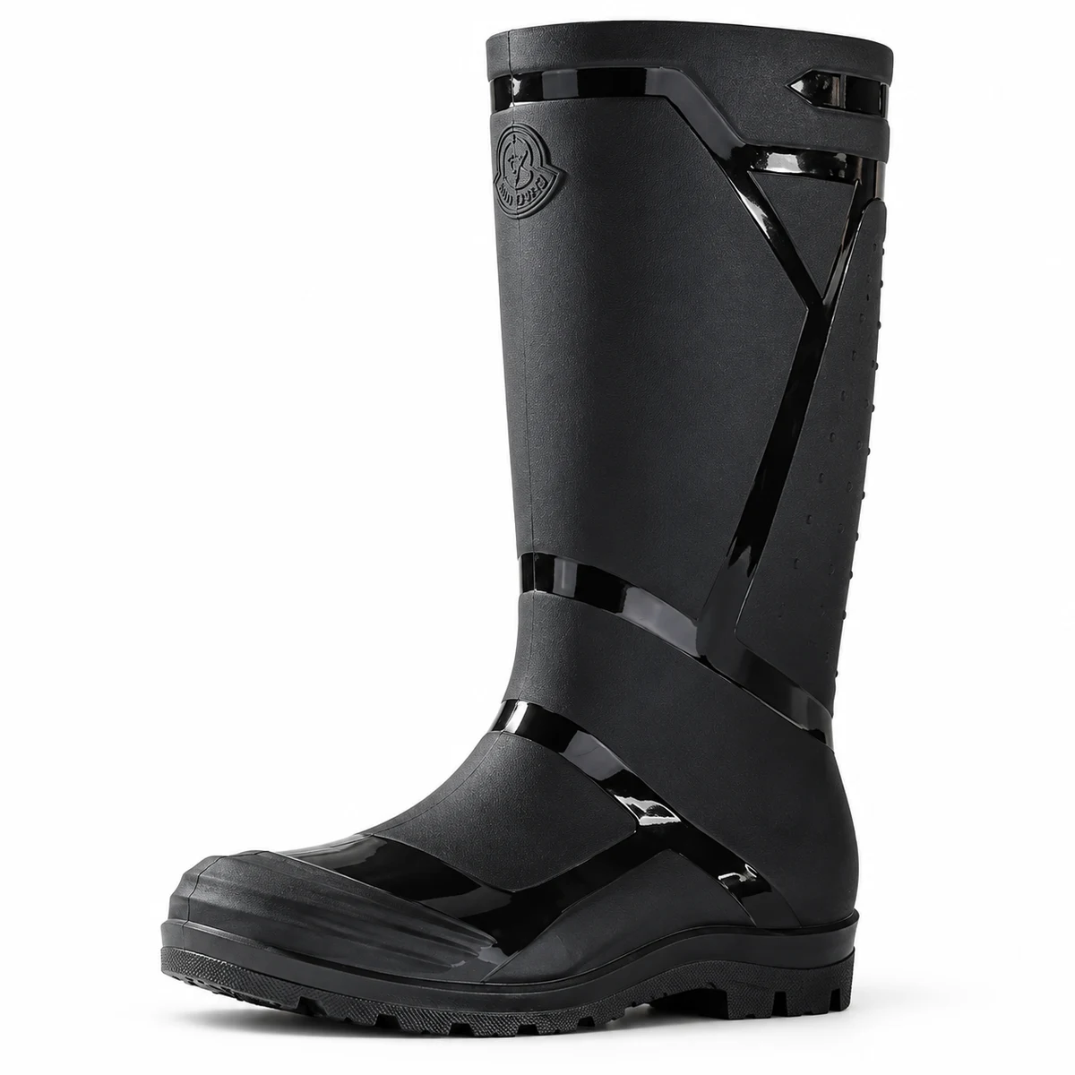 Vue de profil des bottes de pluie noires à découpes contrastées sur fond clair.