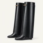 Bottes femme noires à revers long et talon compensé