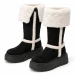 Bottes femme noires fourrées avec grand revers clair pour hiver élégante