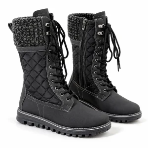 Bottes noires féminines fourrées avec lacets et panneaux matelassés pour hiver