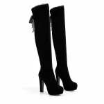 Bottes femme noires fourrées à plateforme et talon haut