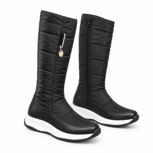 Bottes femme noires fourrées à zip et semelle blanche
