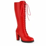 bottes femme rouges hautes a lacets style punk vue de trois quarts sur fond blanc 44770