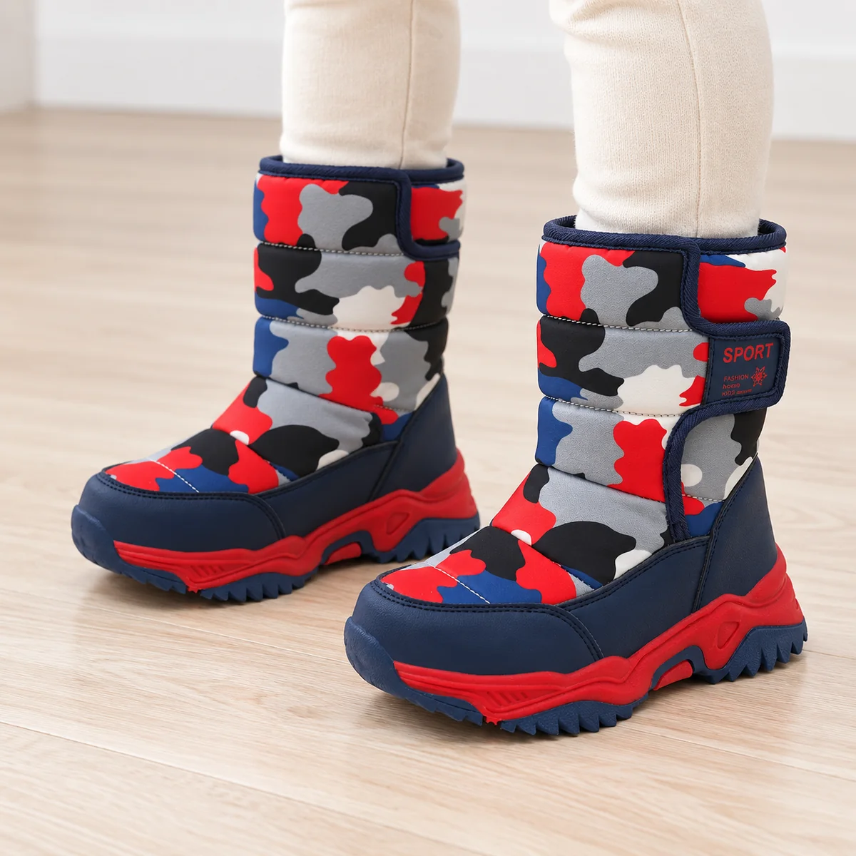 bottes fille bleues et rouges fourrees 44530 11b porte