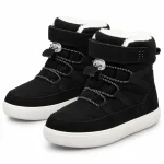 Bottes garçon noires fourrées avec semelle blanche pour hiver