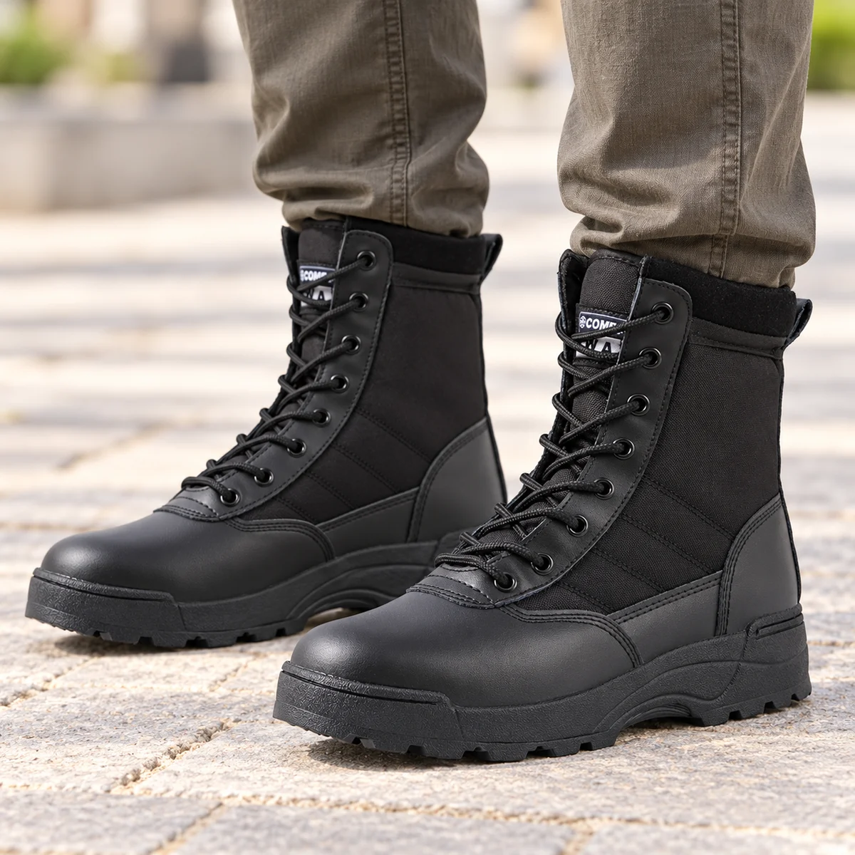 Vue de face des bottes noires pour homme avec lacets robustes