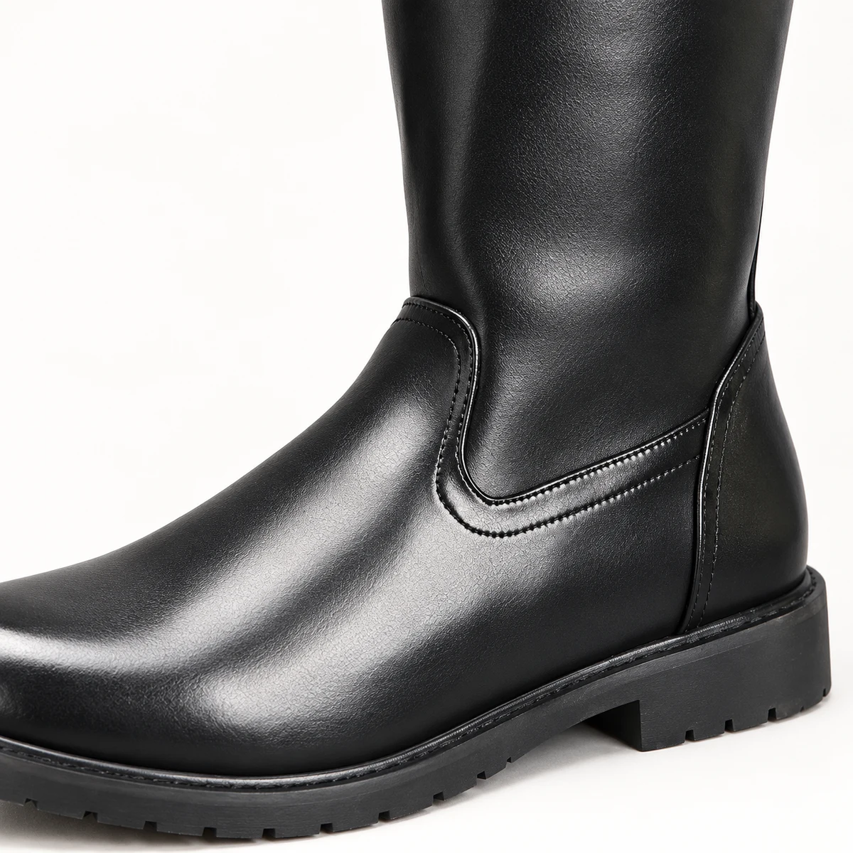 Mode masculine bottes noires hautes à zip et talon discret