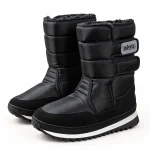 Bottes mixtes noires fourrées avec tige matelassée pour l'hiver
