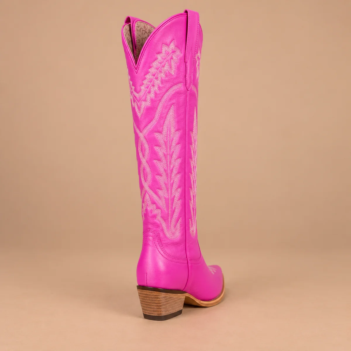 Bottes de cowboy pour femme en cuir rose vif avec broderies artisanales