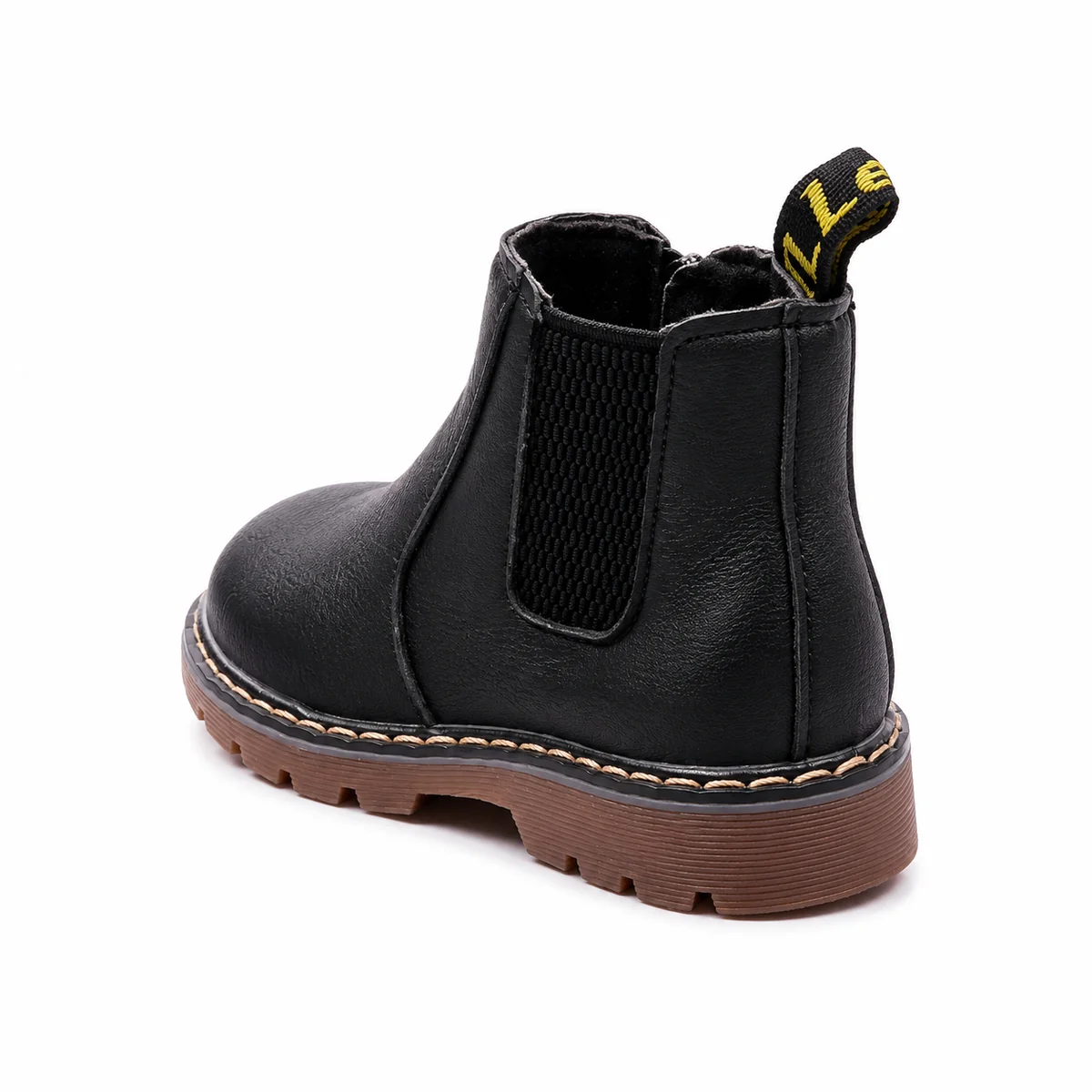 Détail des bottines Chelsea enfant noires à semelle contrastante en cuir