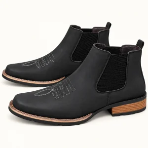 Bottines Chelsea homme noires avec broderies discrètes en cuir élégantes