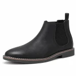Bottines Chelsea noires pour homme avec coutures claires élégantes