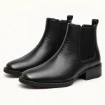 Bottines Chelsea pour homme noires avec motif serpent en cuir élégant
