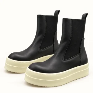 Bottines Chelsea pour homme noires avec plateforme claire et design moderne