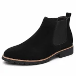 Bottines Chelsea homme noires à semelle crantée et bordée pour un style urbain