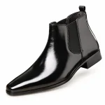 Bottines Chelsea homme noires brillantes à bout effilé en cuir