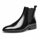 Bottines Chelsea homme noires brillantes à talon bas en cuir élégant