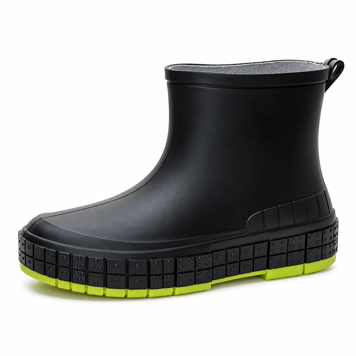 Détail des bottines de pluie noires à semelle vert vif pour femme imperméable