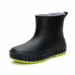 Bottines de pluie noires pour femme avec semelle vert vif élégantes
