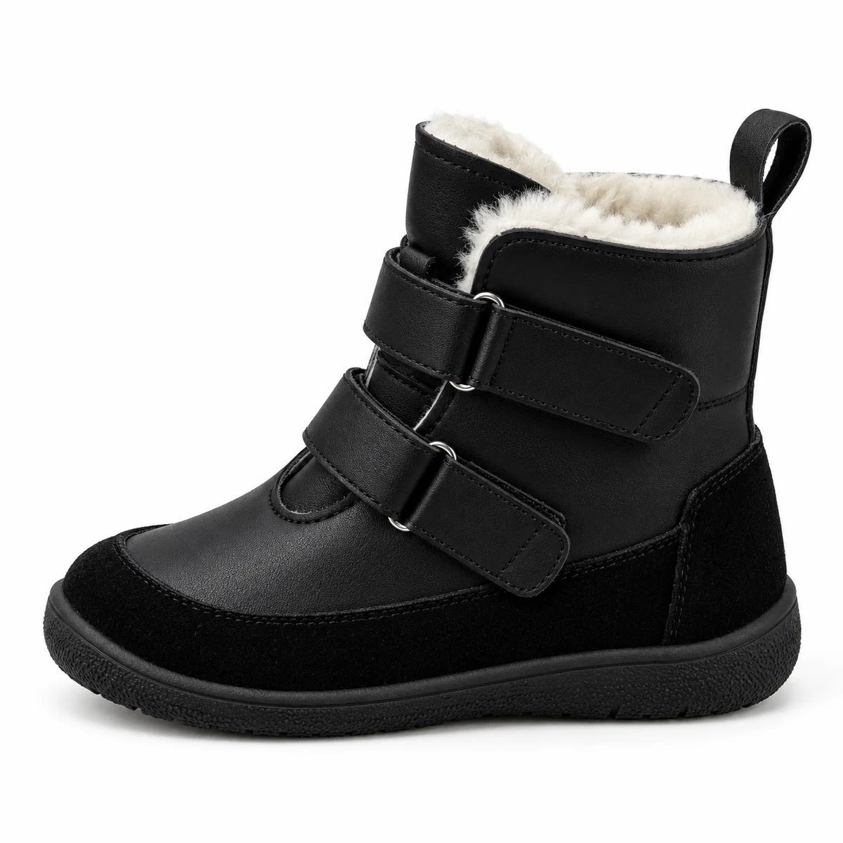 Close-up de bottines enfant en suédine noire avec fermeture à scratchs